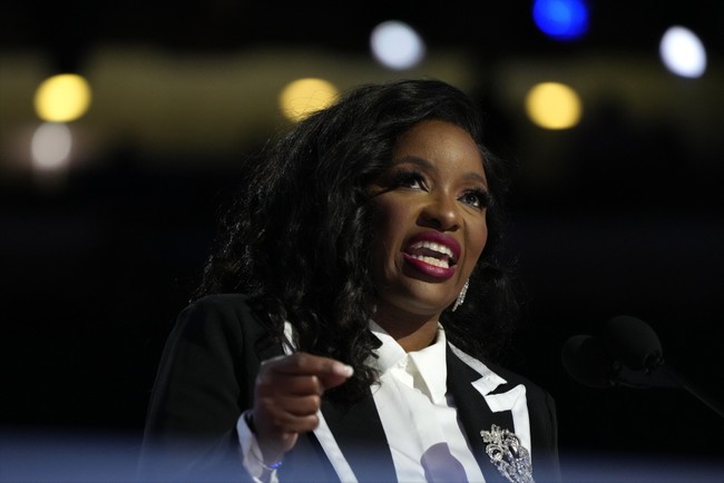 Jasmine Crockett Makes Fun of the Appearance of MAGA Women While Standing by a Man in a Dress